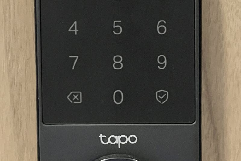 Smart keypad deadbolt on a door